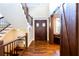 Grand foyer showcasing hardwood floors, a staircase, and a striking barn door at 1000 Holly St, Canton, GA 30114