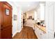 Inviting hallway with hardwood floors and built-in storage at 1000 Holly St, Canton, GA 30114