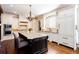 Beautiful kitchen with granite counters, an island, and ample cabinet space at 1000 Holly St, Canton, GA 30114