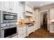 Well-equipped kitchen with stainless steel appliances and elegant cabinetry at 1000 Holly St, Canton, GA 30114