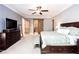 Large bedroom features neutral walls, ceiling fan, walk-in closets, and ensuite at 1000 Holly St, Canton, GA 30114