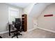 Home office featuring a desk, chair, shelving, and a sign that says, Texas Tech Dr at 1000 Holly St, Canton, GA 30114
