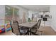 Open dining area with hardwood floors and view of back yard at 265 Lily Cove Dr, Loganville, GA 30052