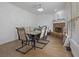 Dining room with hardwood floors, fireplace and natural light at 265 Lily Cove Dr, Loganville, GA 30052