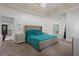 Main bedroom featuring a king bed and sitting area with a ceiling with recessed lighting at 265 Lily Cove Dr, Loganville, GA 30052
