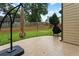 Relaxing patio with outdoor umbrella and grill, perfect for outdoor dining and entertaining at 265 Lily Cove Dr, Loganville, GA 30052