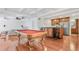 Open-concept basement with a wet bar, pool table, and recessed lighting at 2740 Stonehill Way, Cumming, GA 30041