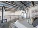 A contemporary bedroom loft with exposed ductwork and industrial-chic touches at 572 Edgewood Ne Ave # 301, Atlanta, GA 30312
