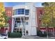 Modern building with red trim and large windows, featuring unique architectural design at 572 Edgewood Ne Ave # 301, Atlanta, GA 30312