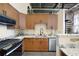 Well-appointed kitchen with granite countertops, stainless steel appliances, and modern cabinetry at 572 Edgewood Ne Ave # 301, Atlanta, GA 30312