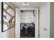 Convenient laundry closet with a modern washer and dryer, maximizing space at 572 Edgewood Ne Ave # 301, Atlanta, GA 30312