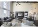 Comfortable living room features large windows, built-in storage, and breakfast bar at 572 Edgewood Ne Ave # 301, Atlanta, GA 30312