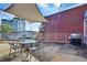 Rooftop deck with grill, dining table and shade at 572 Edgewood Ne Ave # 301, Atlanta, GA 30312