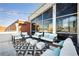 Rooftop patio with modern furniture and string lights at 572 Edgewood Ne Ave # 301, Atlanta, GA 30312