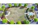 A lovely community park with a gazebo and water feature surrounded by homes and sidewalks at 6425 Bellmoore Park Ln, Johns Creek, GA 30097