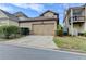 A two-car garage provides ample parking space and convenient access to the home at 6425 Bellmoore Park Ln, Johns Creek, GA 30097