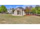 Picturesque gazebo with white columns in a well-maintained community green space at 6425 Bellmoore Park Ln, Johns Creek, GA 30097