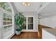 Bright room features a large arched window and lush greenery outside at 1960 Barnes Mill Rd, Marietta, GA 30062