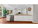 Large kitchen island with sink, stainless steel dishwasher and white cabinets at 1960 Barnes Mill Rd, Marietta, GA 30062