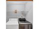Laundry room with modern front loading washer and dryer at 1960 Barnes Mill Rd, Marietta, GA 30062