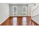 Bright living room featuring hardwood floors and large windows allowing ample natural light at 1960 Barnes Mill Rd, Marietta, GA 30062