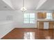 Eat-in kitchen area with tile floors, natural light, and wood cabinetry at 2565 Feywood Ct, Lithonia, GA 30058