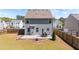 The backyard includes a patio with an outdoor dining set, ideal for entertaining at 269 Shoals Bridge Rd, Acworth, GA 30102
