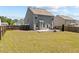 Expansive backyard with a patio, outdoor seating, and a well-kept lawn at 269 Shoals Bridge Rd, Acworth, GA 30102