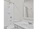 Well-lit bathroom featuring a shower and tub combination, along with a toilet and sink at 269 Shoals Bridge Rd, Acworth, GA 30102