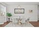 Dining room showcasing a modern chandelier, a mirror, and seating for six at 269 Shoals Bridge Rd, Acworth, GA 30102