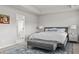 Tastefully decorated bedroom offers a restful retreat with a bed, bench, and stylish accents at 269 Shoals Bridge Rd, Acworth, GA 30102