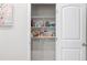 Organized pantry features wire shelving and ample storage space for food and household items at 269 Shoals Bridge Rd, Acworth, GA 30102