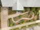 Aerial view showing the front of the home, driveway, and decorative garden at 4 Arc Ne Way, Atlanta, GA 30305