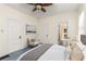 Bedroom with an ensuite bathroom, neutral decor, and plenty of natural light at 4 Arc Ne Way, Atlanta, GA 30305