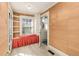 Bedroom with grasscloth wallpaper, a window seat, and white trim at 4 Arc Ne Way, Atlanta, GA 30305