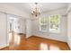 Bright dining room featuring hardwood floors, large windows, and an elegant chandelier at 4 Arc Ne Way, Atlanta, GA 30305