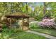 Close up of the gazebo showing flowers, bushes, and stone pathway at 4 Arc Ne Way, Atlanta, GA 30305
