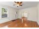 Charming living room with hardwood floors, large windows, and classic ceiling fan at 4 Arc Ne Way, Atlanta, GA 30305