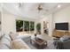 Relaxing living room features a sliding door to the outdoor deck and natural light at 4 Arc Ne Way, Atlanta, GA 30305