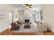Bright living room featuring hardwood floors, a fireplace, and plenty of natural light at 4 Arc Ne Way, Atlanta, GA 30305