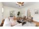 Inviting living room showcases hardwood floors and seamless access to the dining area at 4 Arc Ne Way, Atlanta, GA 30305