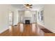 Spacious living room boasting gleaming hardwood floors and a charming fireplace at 4 Arc Ne Way, Atlanta, GA 30305