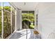 Relaxing screened porch with natural light, classic white columns, and seating at 4 Arc Ne Way, Atlanta, GA 30305