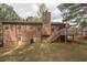 A well-maintained backyard with a wooden deck, perfect for outdoor relaxation at 4020 Cranwood Dr, Atlanta, GA 30349