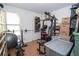 Bedroom with a window, a closet, carpeted floor and exercise equipment at 4020 Cranwood Dr, Atlanta, GA 30349