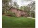 Charming home with wood siding and a well-maintained lawn at 4020 Cranwood Dr, Atlanta, GA 30349