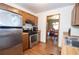 Well-equipped kitchen with stainless steel appliances and views into the dining room at 4020 Cranwood Dr, Atlanta, GA 30349