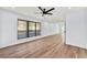 Open floorplan living room with wood floors, neutral walls, recessed lighting, and backyard access at 459 Orchard Dr, Stone Mountain, GA 30083