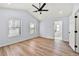 Airy main bedroom with hardwood floors and ensuite bath at 459 Orchard Dr, Stone Mountain, GA 30083