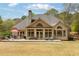 Expansive backyard with large deck for outdoor entertaining and relaxation at 107 Grand Ave, Suwanee, GA 30024